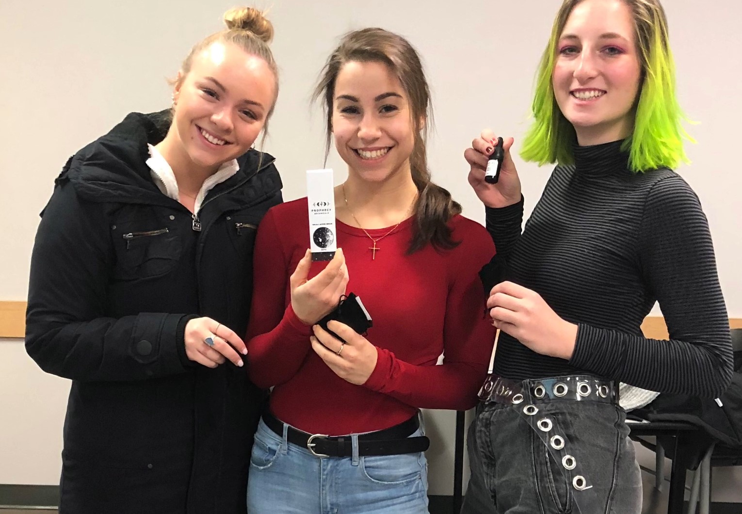 Our trio posing for our in-class win with the product and our two-piece packaging concept